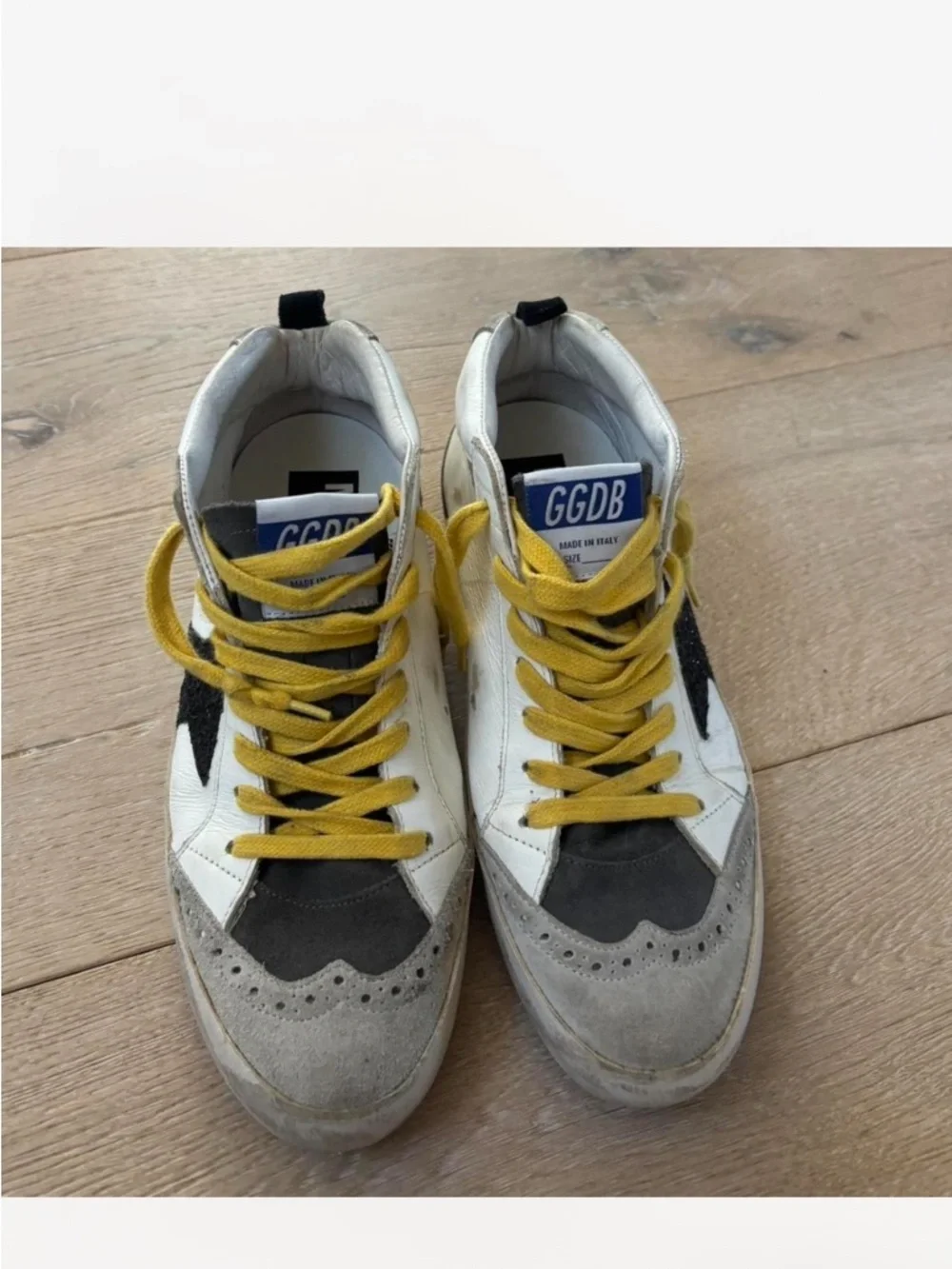 Golden Goose White Leather Mid-Top Sneakers with Black Star and Yellow Laces - Picture 2 of 6